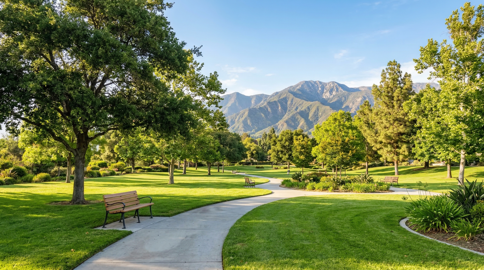 Serene community park in San Bernardino with walking paths and mountain views