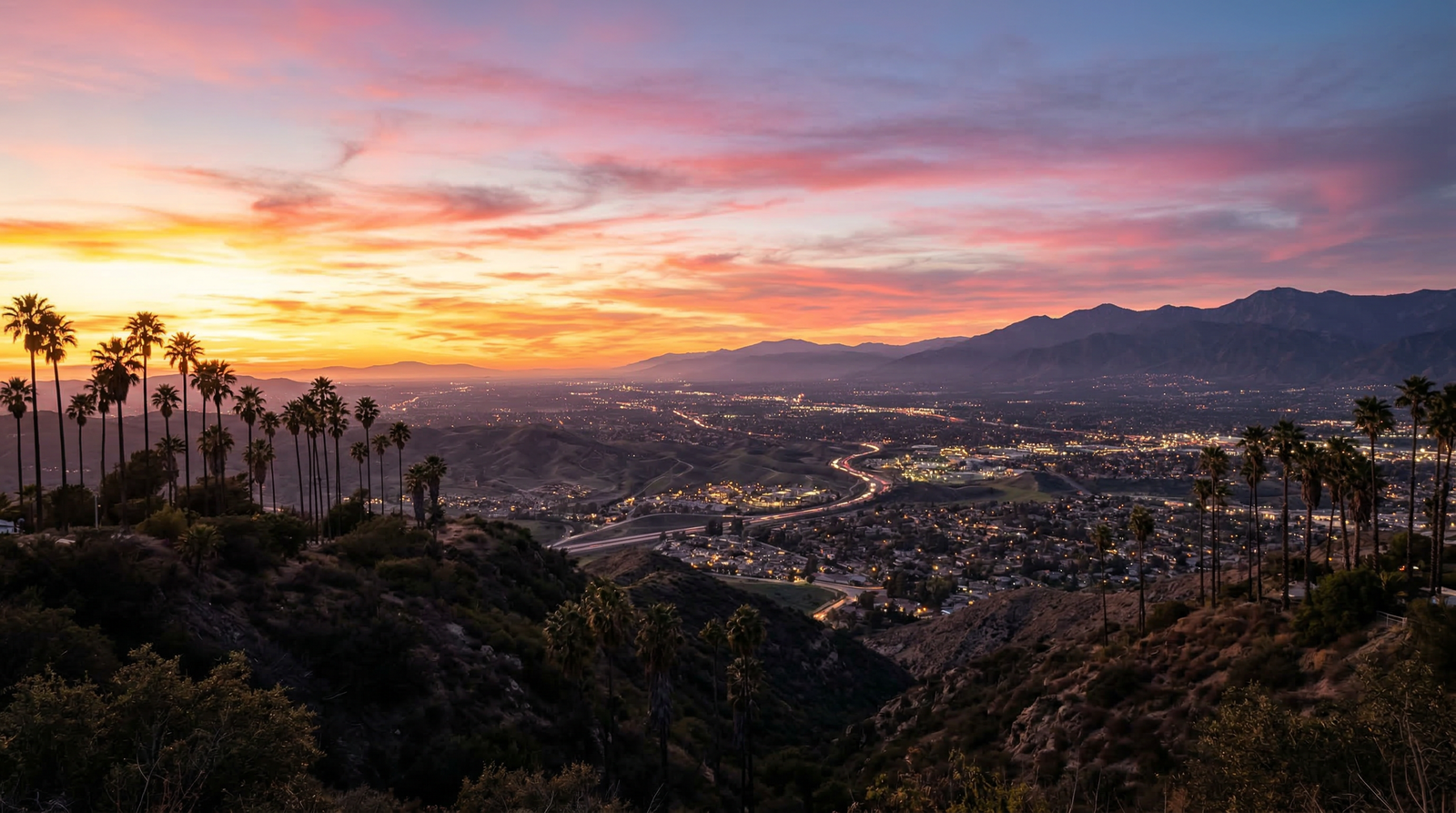 Golden sunset panorama over the Inland Empire with mountain silhouettes